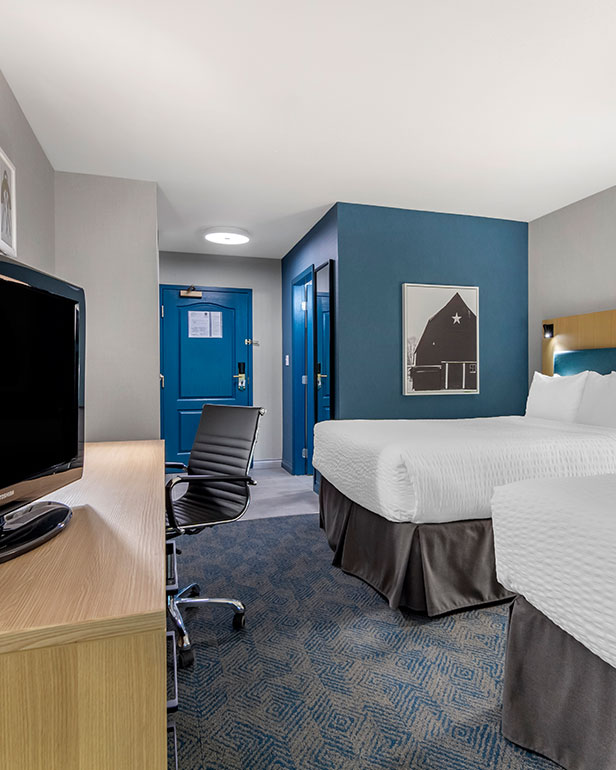 Two Queen/One King Room